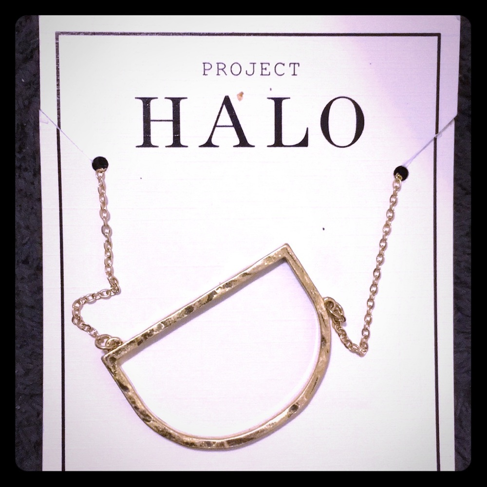 Gold necklace with big capital “D” initial